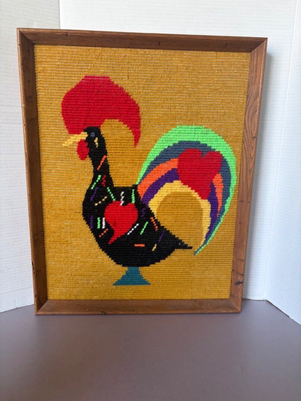Handwoven Rooster Wall Hanging In Wooden Frame Vibrant Colors On Yellow Backgrou